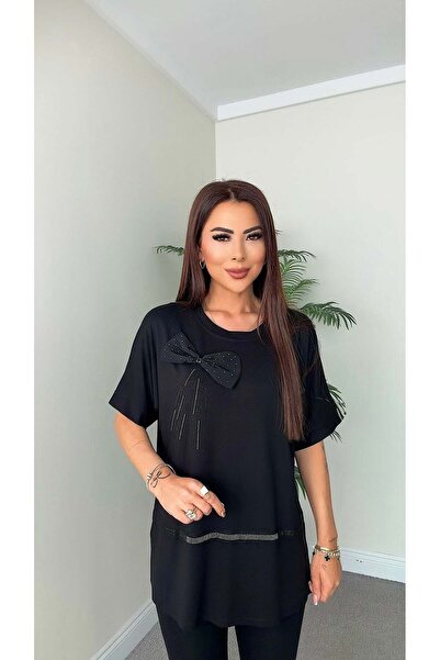 DİDEM GÜLTAKTI بلوزة نسائية سوداء بتفاصيل فيونكة من نينا