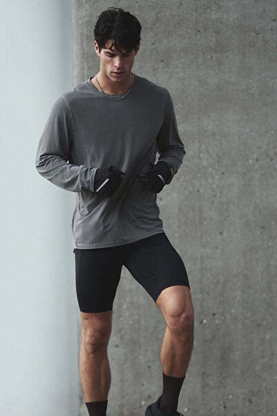 H&M بلوزة رياضية Muscle Fit مع DryMove™