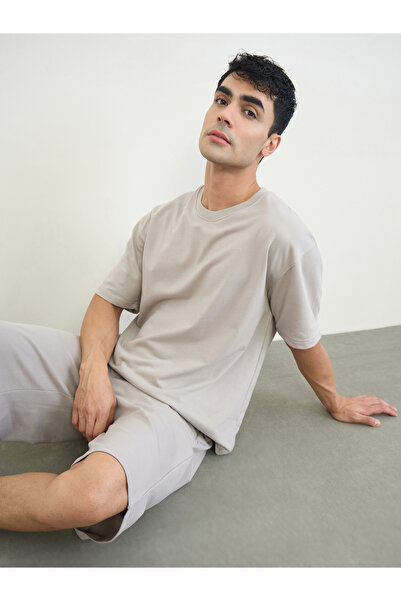 Styli Men Slogan Print Oversized T-Shirt and Shorts Set