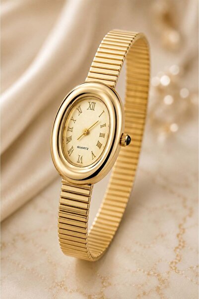 The Watch ساعة يد نسائية من Saudade بسوار فولاذي ذهبي مرن - هيكل بيضاوي عتيق،...