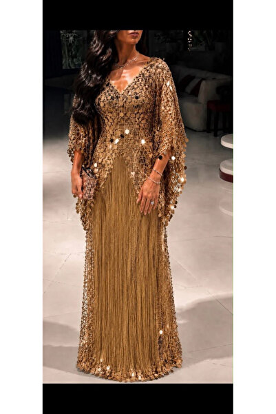 FASHION فستان سهرة فخم بتصميم كاب وشبكة مطرزة بقطع براقة مع شراريب انسيابية ي...