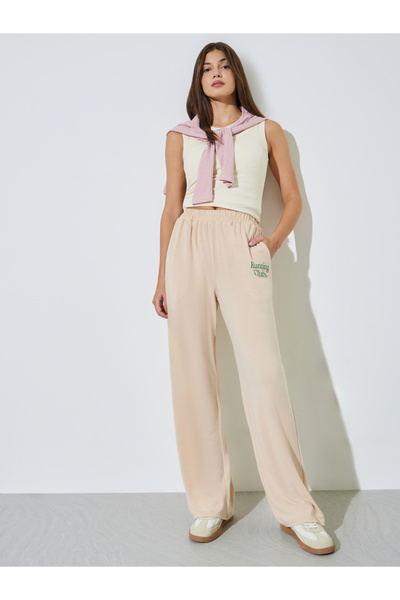 Styli Beige Slogan Print Knitted Wide Leg Joggers