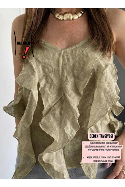 salome butik بلوزة مكشكشة من قماش تنسل بحزام من الموسم الجديد