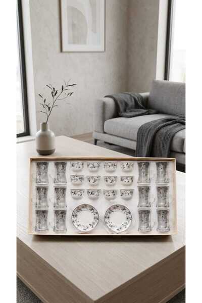 Generic A luxurious hospitality set – coffee cups and tea glasses with elegan...