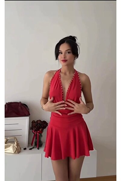 MODA The new season dress with staple details, degaje collar and shorts is ve...
