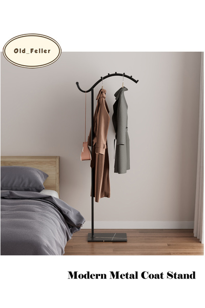Old_Feller Nordic-style freestanding metal coat rack in a seahorse design, id...