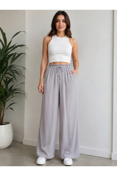 Butik Kadın Taş Rengi Beli Lastikli Bağcıklı Bol Paça Tensel Pantolon