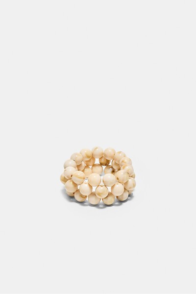 Stradivarius سوار مطاطي مزين بالخرز
