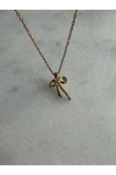 Alya Jewelry قلادة من الفولاذ موديل فيونكة الزركون الذهبية