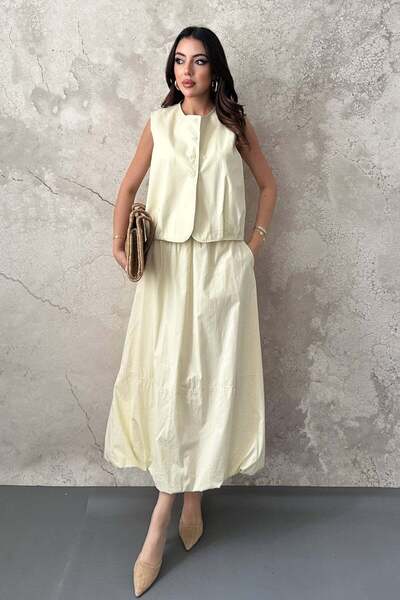 Moda Days طقم تنورة نسائية من قماش البوبلين الأصفر بدون أكمام وأزرار وخصر مطا...