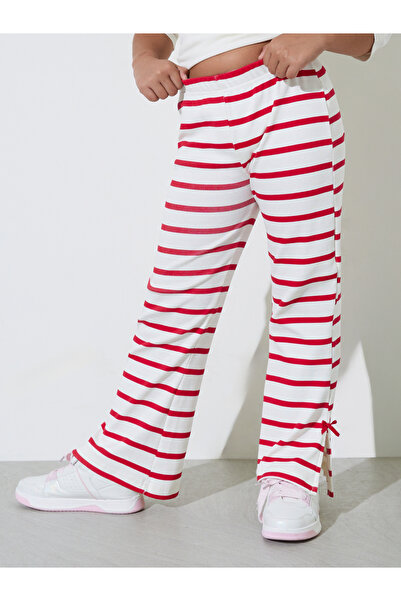 Styli Teen Girls Striped Ribbed Knit Flare Leggings with Side Bow Slits