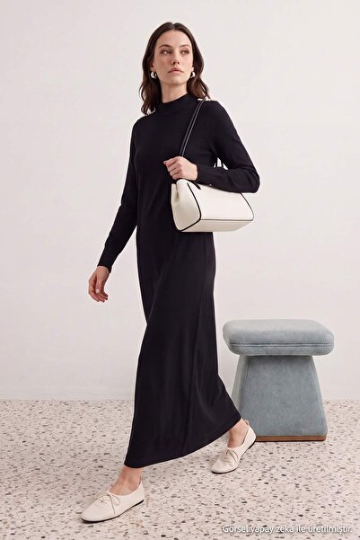 Trendyol Modest فستان حجاب أسود بدون بطانة من التريكو المسطح بحزام واحد TCTAW...