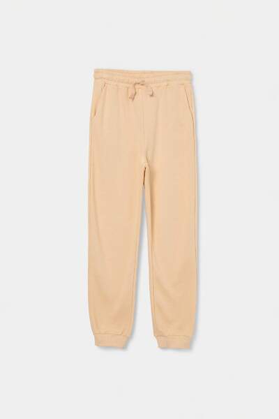 TRENDYOLKIDS Pantaloni de trening bej pentru băieți TKDAW27EA00009