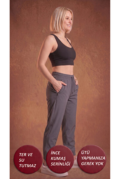 Leopars Women's Smoked Elastic Waistband 3-Pocket Zippered Parachute Sweat-Wi...