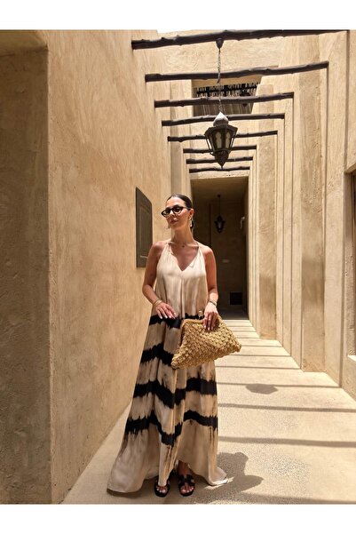 sinemkivanc co SIRT DEKOLTELİ ZEBRA DESEN ELBİSE