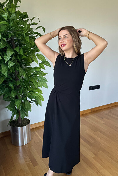 PİCCO Kadın Bisiklet Yaka Kolsuz Büküm Düğüm Detaylı Slim Fit Midi Krep Elbis...