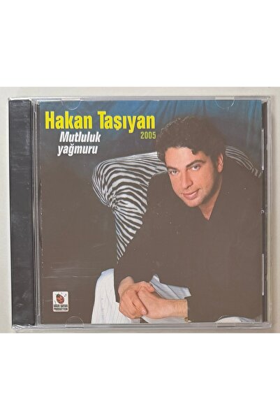 UĞUR BAYAR PRODÜKSİYON هاكان تاشيان 2005 مطر السعادة سي دي بدون جيلاتين