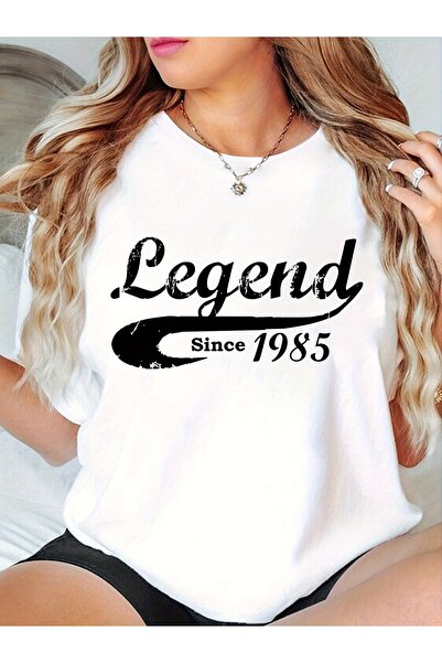 BASEPULSE تي شيرت نسائي بطباعة "Legend Since 1985" - قميص أسود بياقة دائرية و...