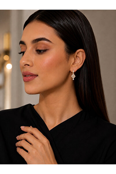 Generic Earrings or earrings in gold color from the zabricon for the maspates...