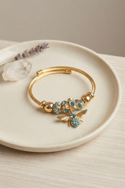 Inure Jewelry سوار ذهبي اللون من طراز بلو آري موديل جولد