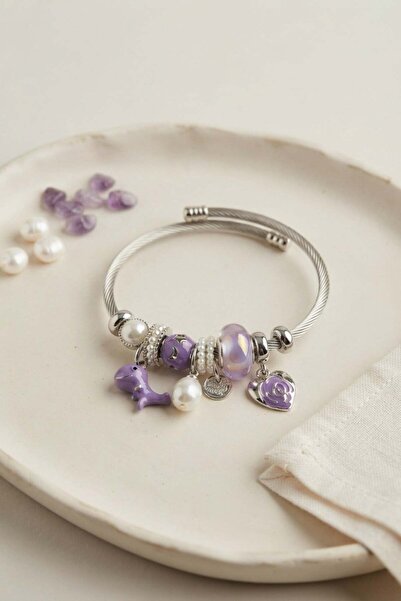 Inure Jewelry سوار مور دينو تشارمي