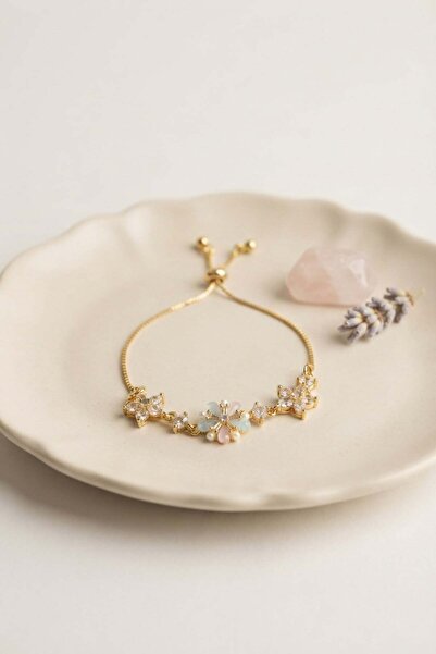 Inure Jewelry سوار مصعد ملون من النحاس مرصع بحجر الزركون باللون الذهبي طراز ب...