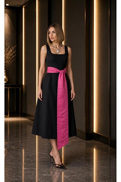 SERAVENZA COUTURE فستان من الكريب الأسود متوسط الطول بتفاصيل من التفتا الفوشي...
