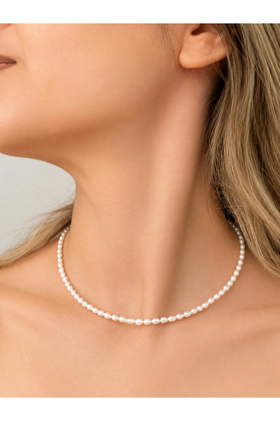 OZY COLLECTION Minimal inci kolye 4 mm arpa model, takma aparatı çeliktir.