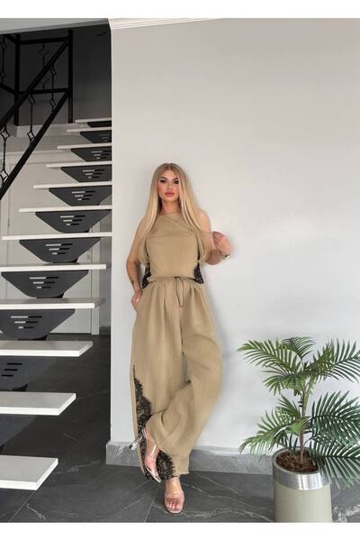 Bella Belluci بدلة بدون أكمام بتفاصيل من الدانتيل