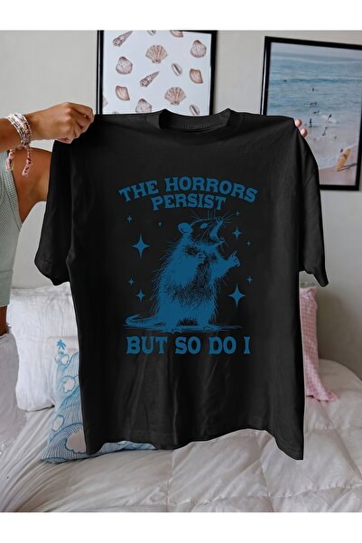 2mcup تي شيرت نسائي بتصميم جرافيك مضحك وجريء بطبعة "The Horrors Persist But S...