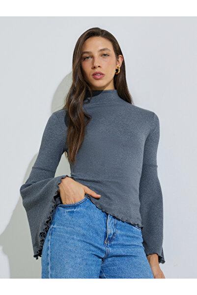 Styli Mock Neck Wavy Sleeve Knit Top