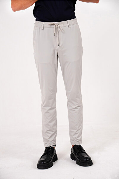 GMG FIRENZE Men's jogger pants with elastic waistband, back pockets, and snap...