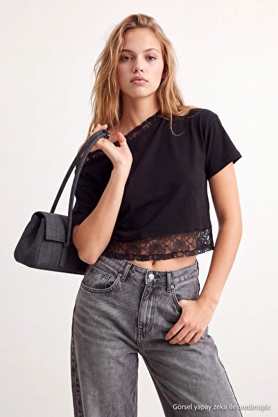 Trendyol Collection تي شيرت محبوك بياقة دائرية غير متماثلة ومقاس ضيق باللون ا...