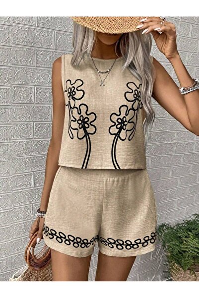 Iuliashop Set Aisha bej cu imprimeu negru, format din bluză și pantaloni - M