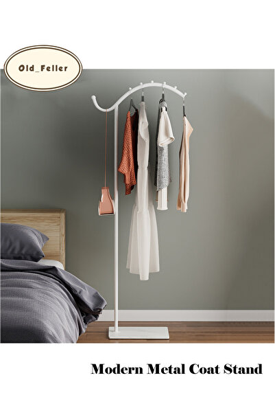 Old_Feller Nordic-style freestanding metal coat rack in a seahorse design, id...