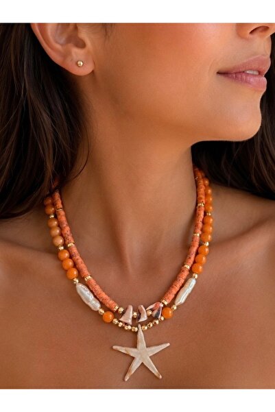 ANKA JEWELLRY قلادة نسائية من الفولاذ بتفاصيل نجم البحر وتفاصيل خرز برتقالية ...