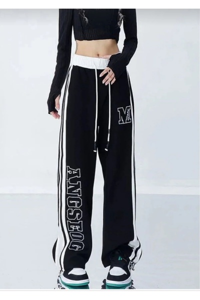 eyonnwear بنطلون رياضي أسود فضفاض للجنسين مخطط واسع الساق على طراز هاراجوكو