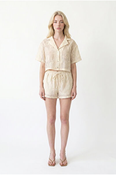 Quzu Embossed Embroidered Elastic Waist Mini Shorts Cream