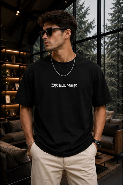 Clothify تي شيرت كبير الحجم للجنسين مطبوع عليه Dreamer مصنوع من القطن بنسبة 100%