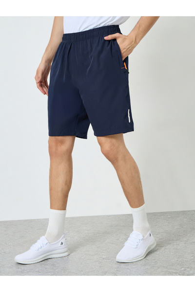 Styli Men Reflector Print Training Shorts with Zipper Pocket