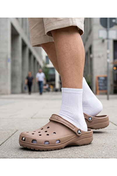 Crocs شباشب كلاسيكية للجنسين - راحة أيقونية وتصميم كروسلايت خفيف للغاية