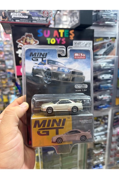 mini gt 1:64 Nissan Skyline GT-R (R34) M-Spec Silica Breath Gold