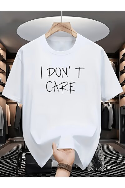 NOURAM تي شيرت مطبوع عليه بخط اليد بعبارة "I DON'T CARE" - تي شيرت بقصة مريحة...