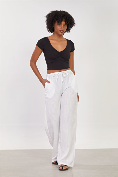BARRELS AND OIL Women's elastic waist frayed wide leg pants - white