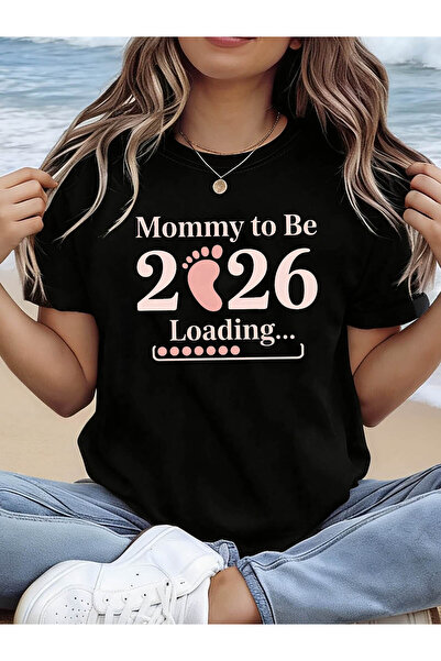 NOURAM قميص كاجوال للنساء بطباعة 'Mommy to Be 2026 Loading' بأكمام قصيرة وياق...