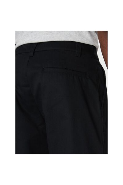 Champion Pantaloni bărbați din material textil 220715 Negru