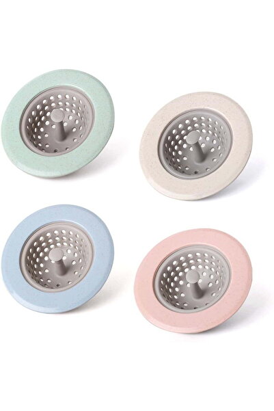 STARSTAR Four silicone kitchen sink strainers, wide rim, 4.5 inches in diameter.
