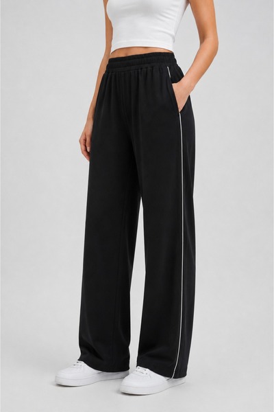 Grenj Fashion Μαύρο παντελόνι μονόχρωμο με τσέπες, ψηλόμεσο και φαρδιά μπατζάκια