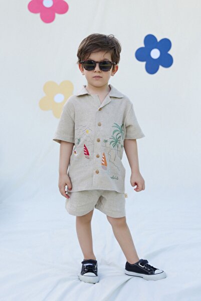 Miela Kids طقم قميص وشورت من الكتان من Palm Life