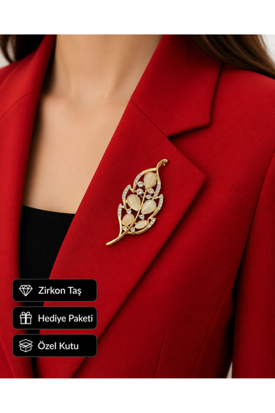 HER ŞEY NOTA www.herseynota.com Hediye Gold Yaprak Tasarımlı Taşlı Kadın Broş...